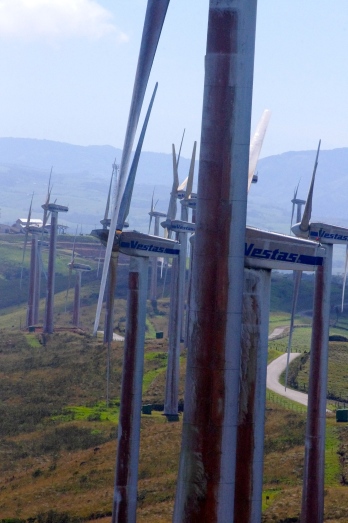 Wind turbines soar above the Costa Rican landscape on Thursday, Jan.3, 2013. The turbines are part of a government-operated wind farm and have been in use since 2003. (Missouri School of Journalism/Aaron Braverman)